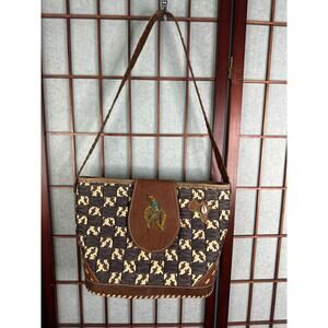 Handmade African woven black handbag with clean inside